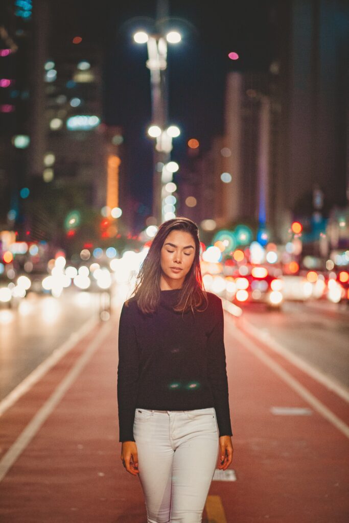 Woman walking with eyes closed