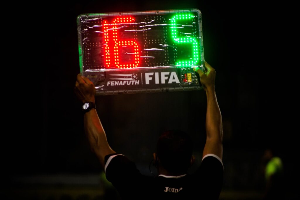 Referee with scoreboard